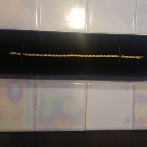 Open and gold bracelet